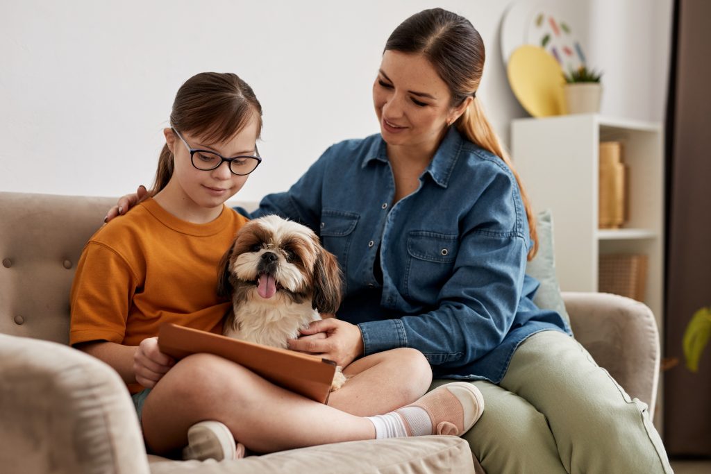 Young Mother And Daughter With Down Syndrome
